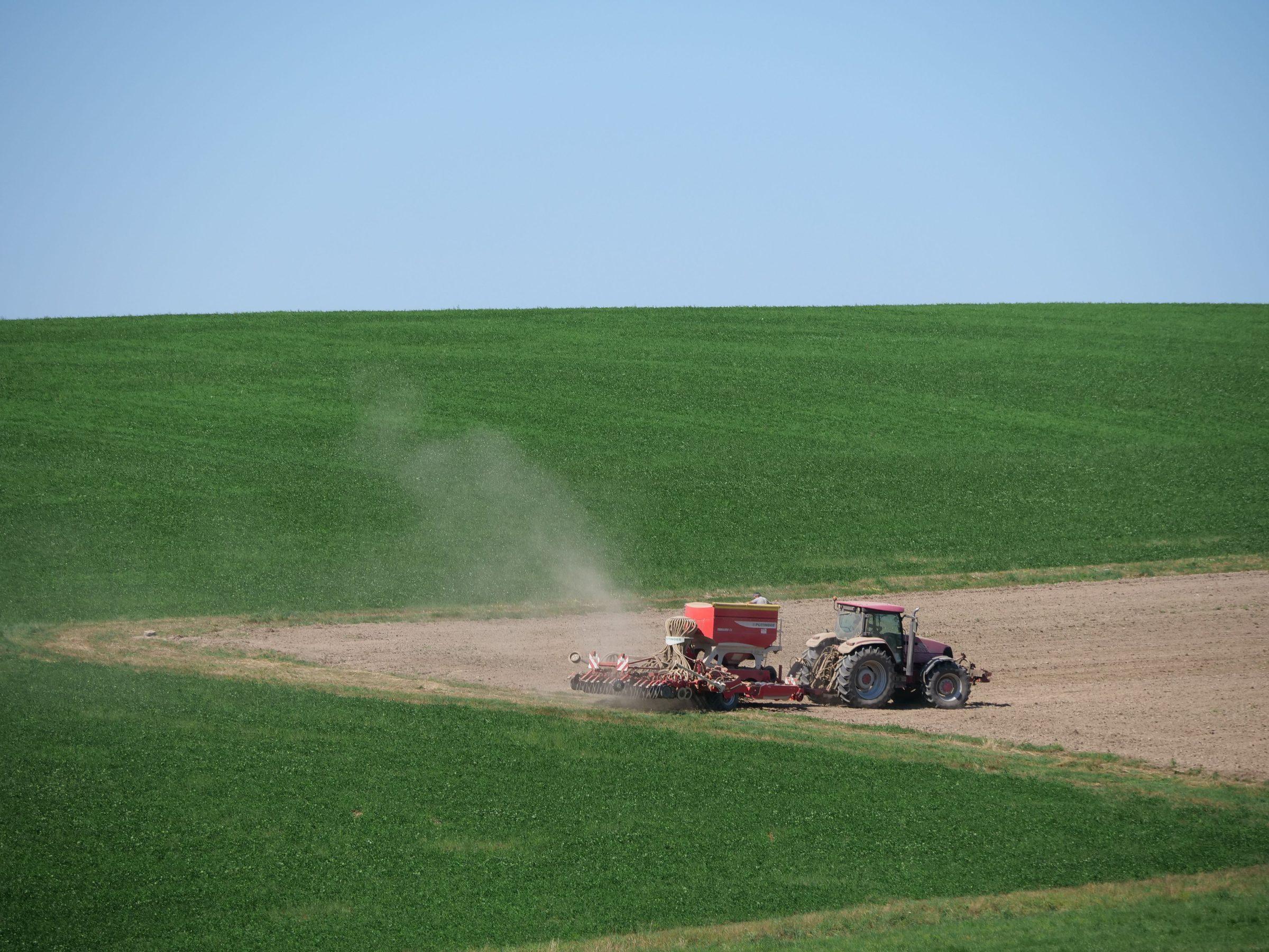 PRECISE precision agriculture field with auto-steering tractor