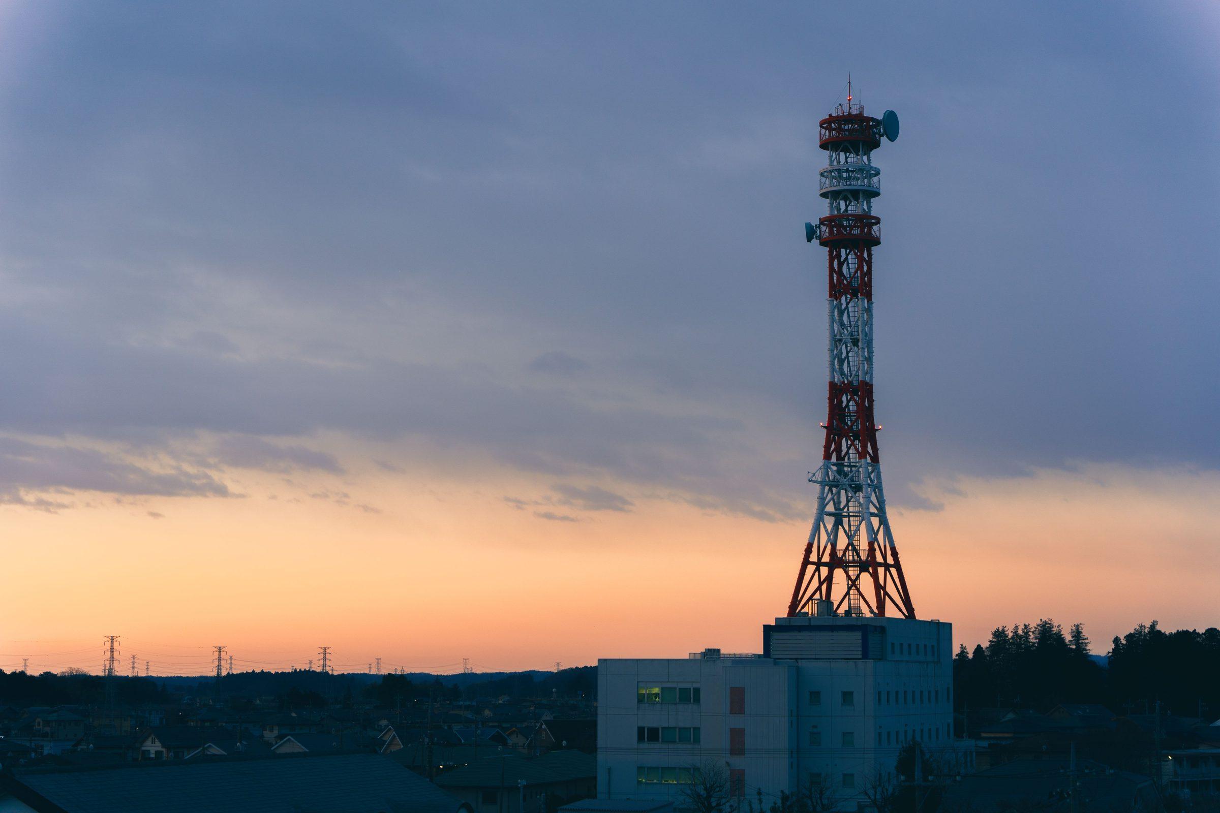 Communications tower on a rooftop, the kind of fixed installation PRECISE AN2 is built for